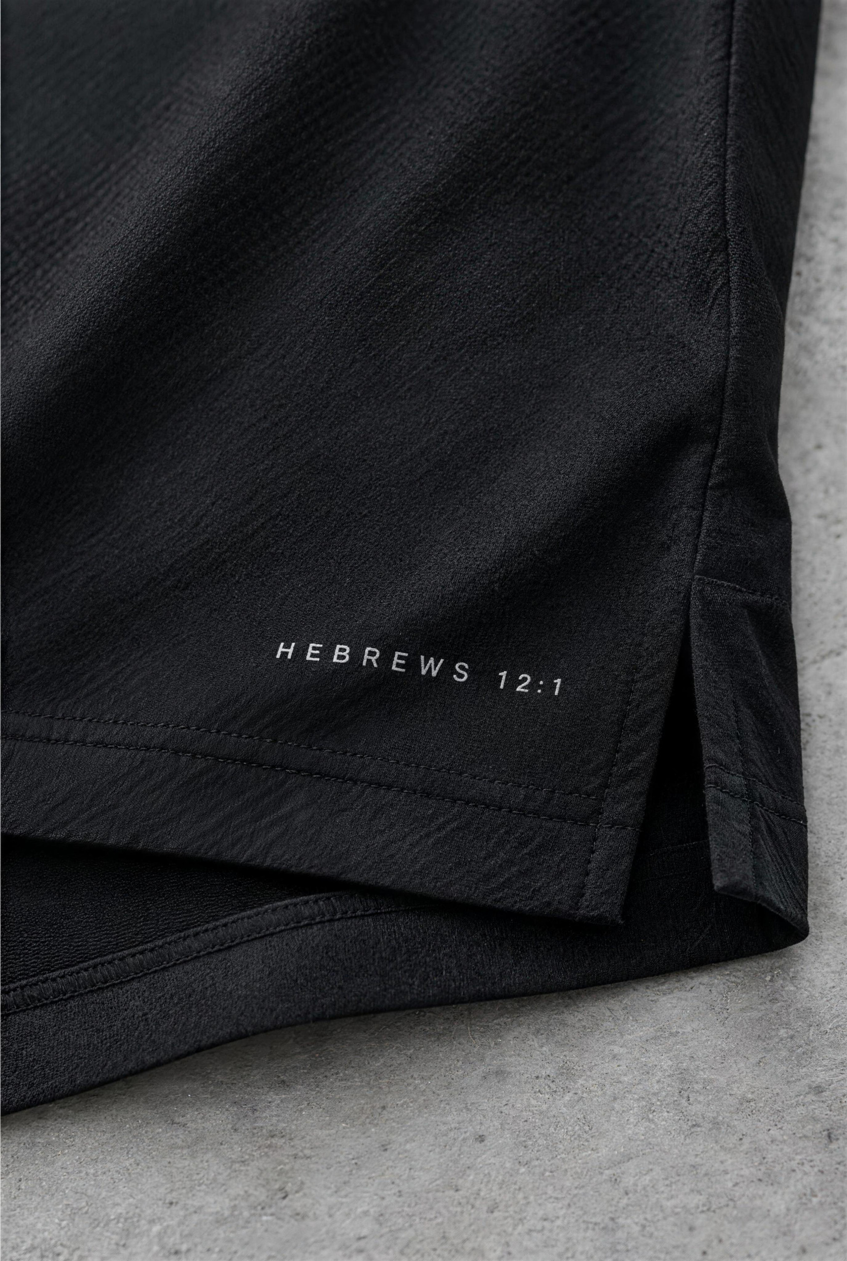 Hem detail with the Hebrews 12:1 reference