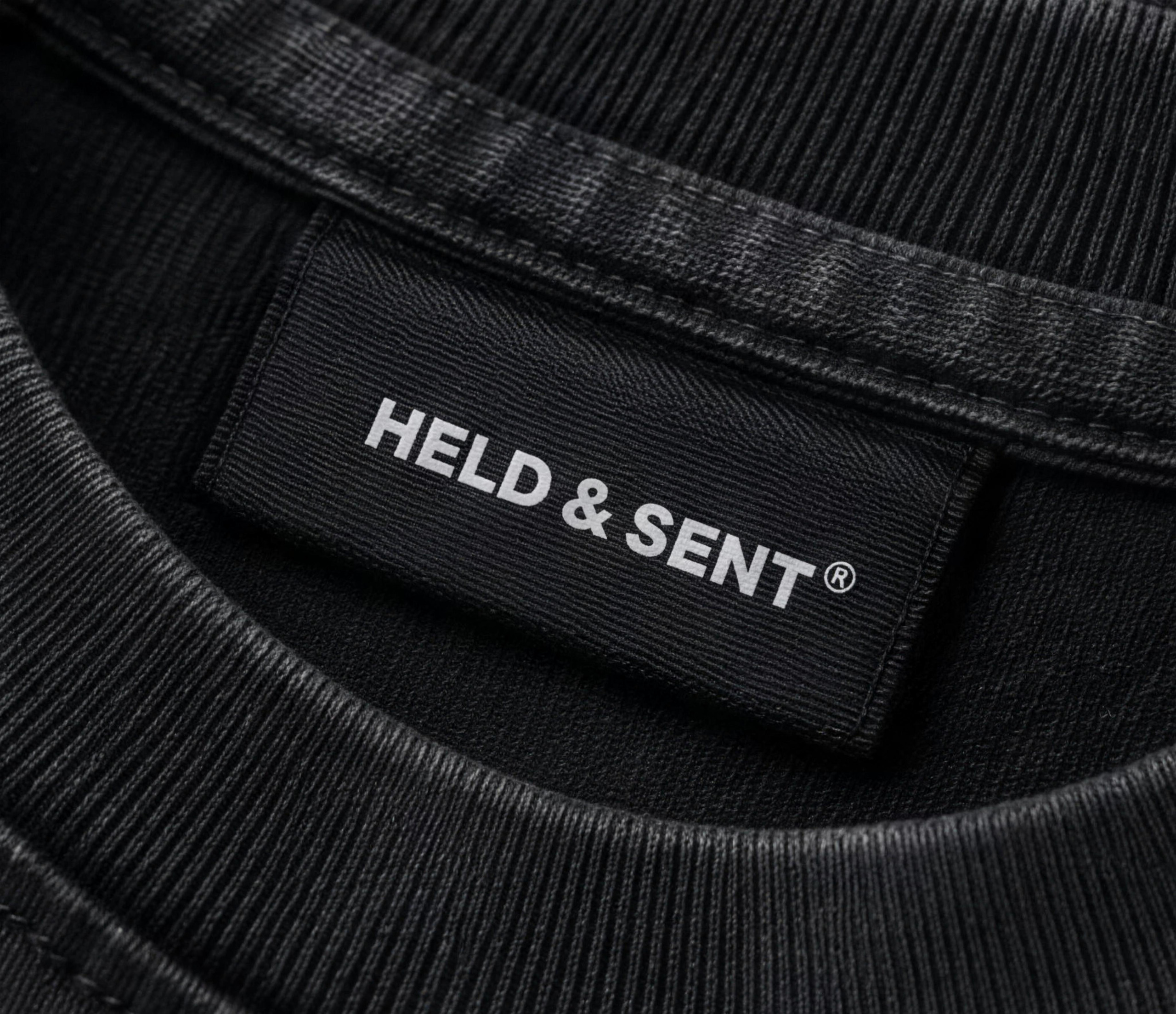 Woven neck label inside the Covenant Tee