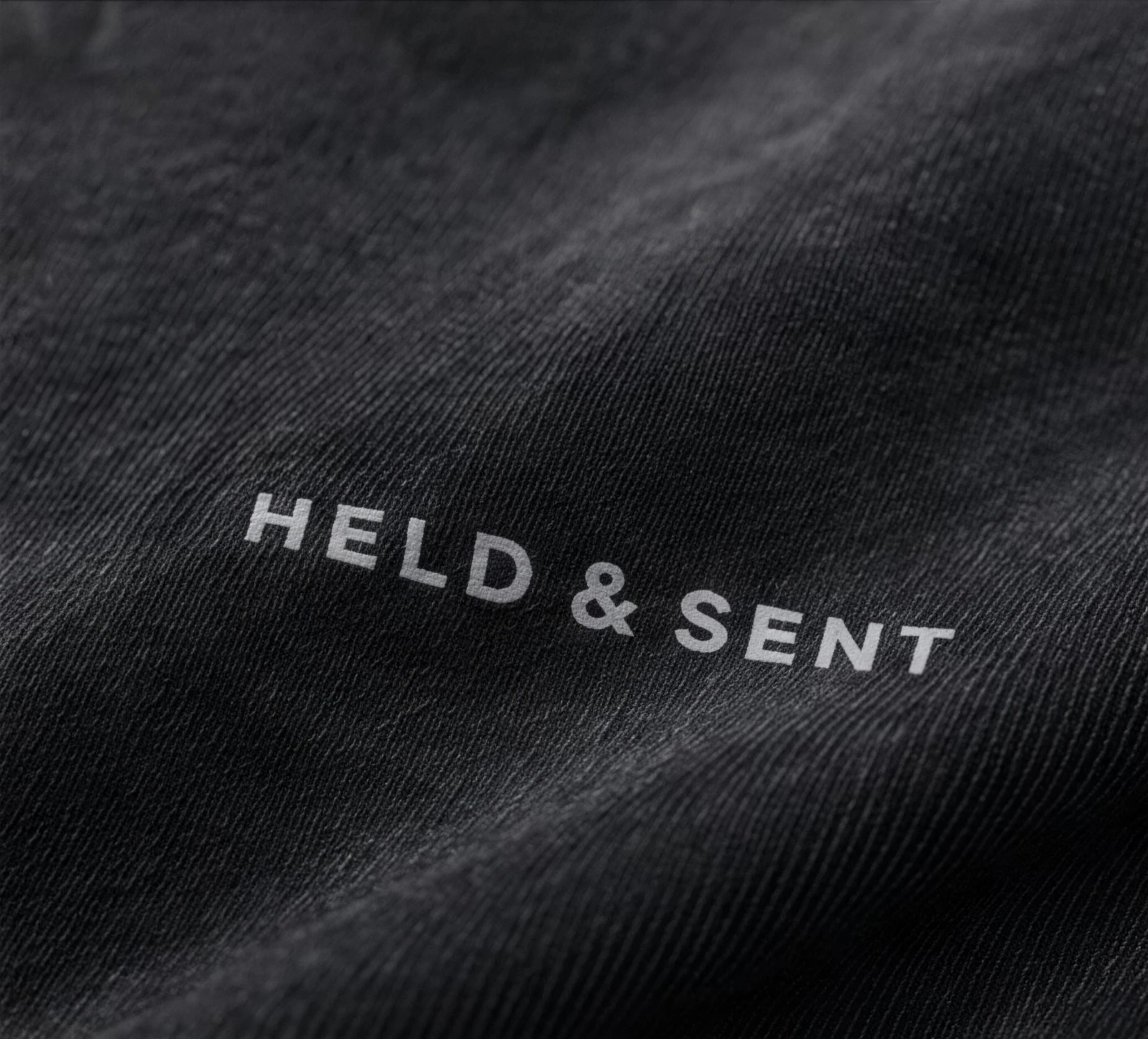 The wordmark printed tonally across washed fabric