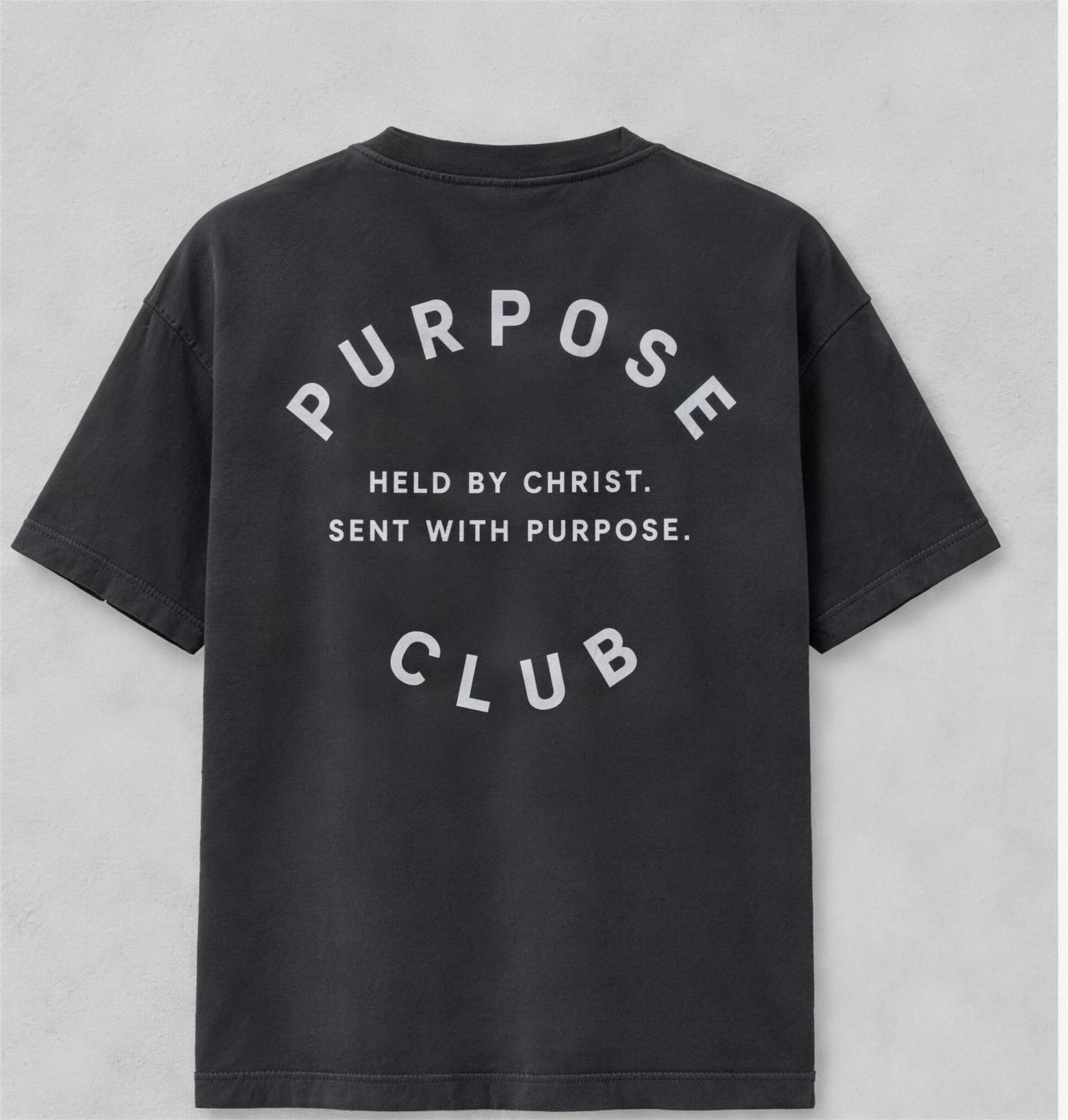 Back of the tee: PURPOSE CLUB arced above and below the core line